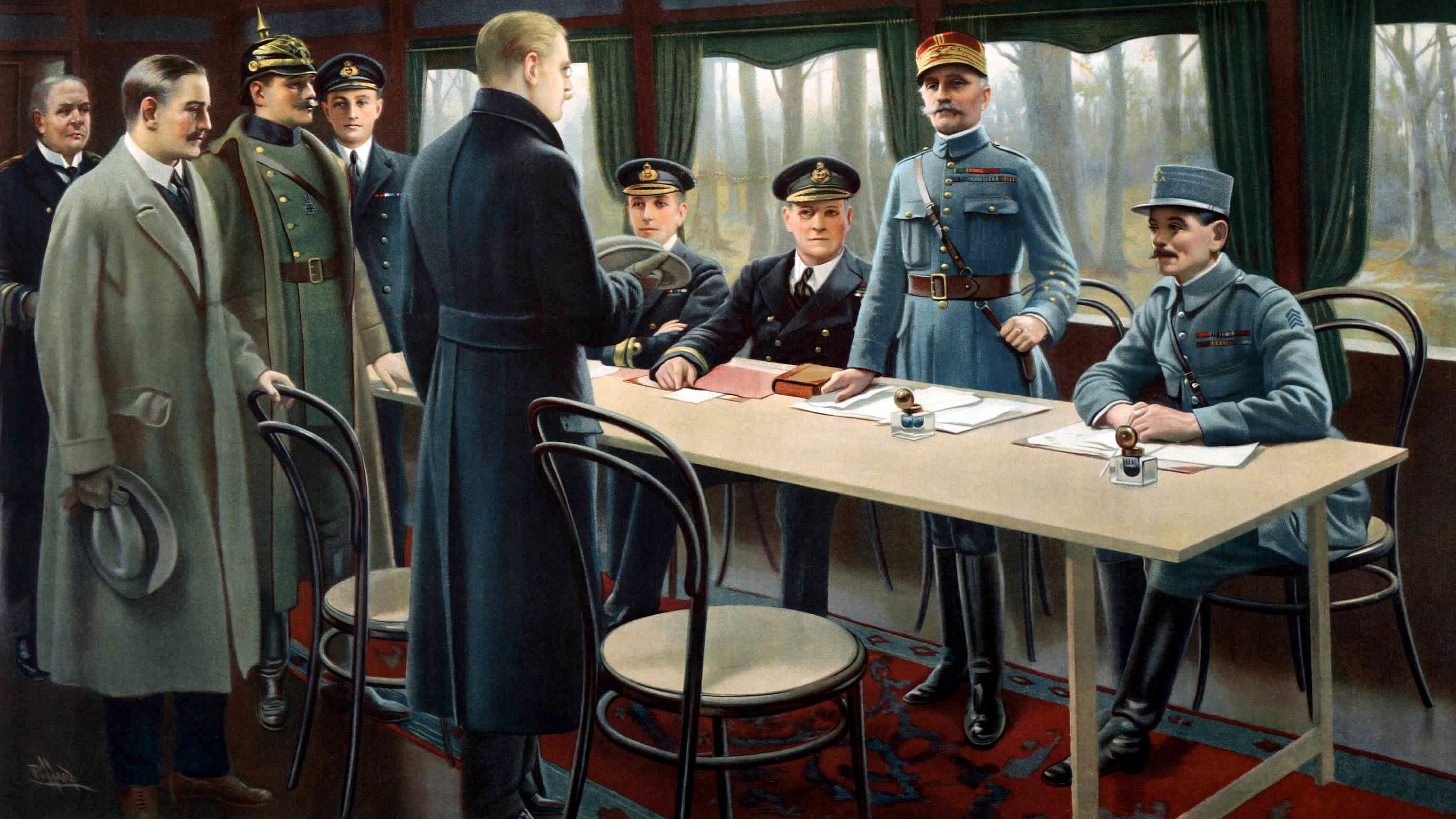 Unterzeichnung des Waffenstillstandsabschlusses vom 11. November 1918 in einem Eisenbahn-Salonwagen im Wald von Compiègne. Koloriertes Foto: Maurice Pillard Verneuil, gemeinfrei Verlinkung zu Das Ende des Ersten Weltkrieges