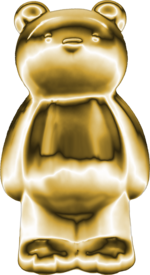 Foto des goldenen Erklärbären, eine goldene Plastefigur in Form eines Bären.